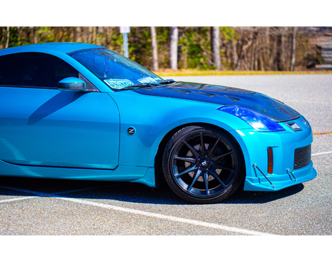 Co2Passions 350z HR Wrapped in atomic teal 3 m with carbon fiber accents and wing with aftermarket wheels and nos pillow