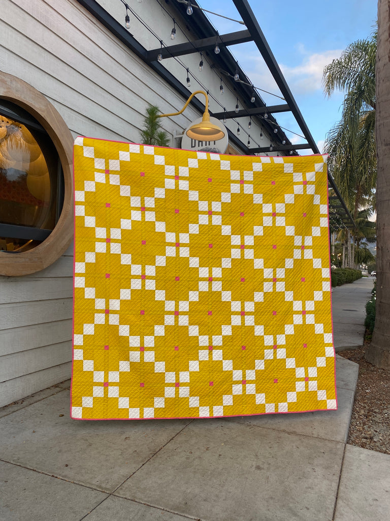 Harken Quilt in front of coffee shop