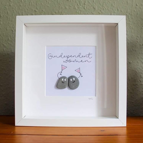 pebble art in a frame