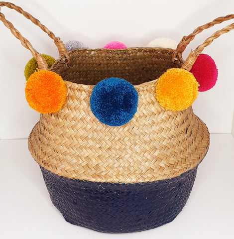 Upcycled basket with pompoms