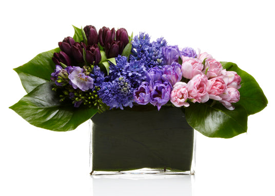 Platinum by H.Bloom is a luxury floral arrangement featuring ombre purple flowers.