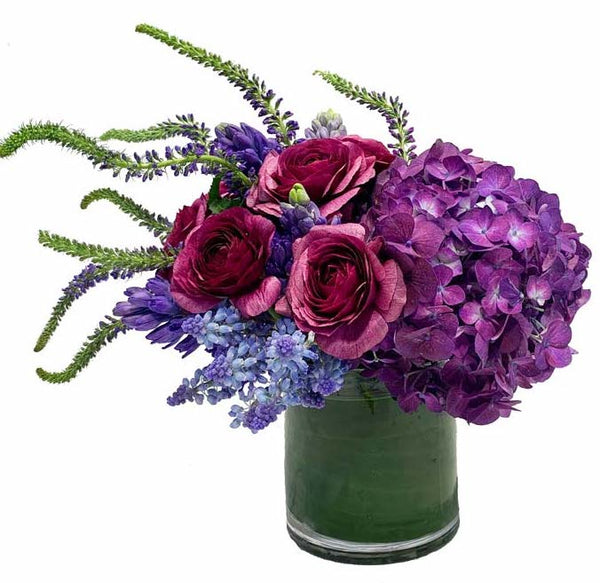Queen Bee by H.Bloom is a unique floral arrangement featuring hydrangeas and other florals.