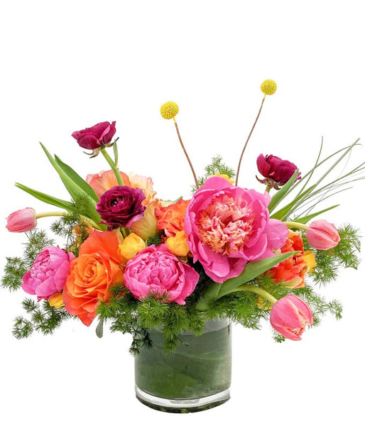 A springtime floral design featuring tulips, peonies, and roses, called Honey Bee by H.Bloom.