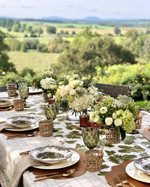 Earthy table decor featuring luxury flowers by H.Bloom.
