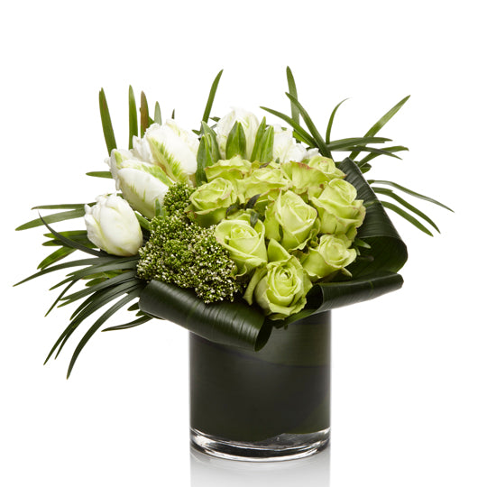 Spearmint by H.Bloom is a fresh luxury floral arrangement with green roses and white tulips.