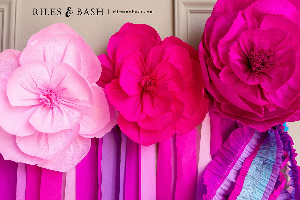 Riles & Bash Pink & Purple Streamer Backdrop with Crepe Paper Flowers