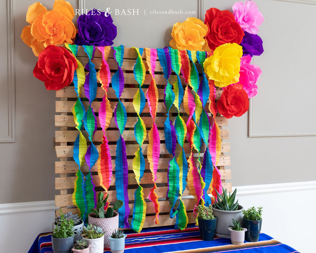 Riles & Bash Fiesta Mexican Streamer Backdrop with Crepe Paper Fiesta Flowers_How to Build a Fiesta Backdrop_Cinco De Mayo_Fiesta_Taco Bar Party_Riles & Bash Party