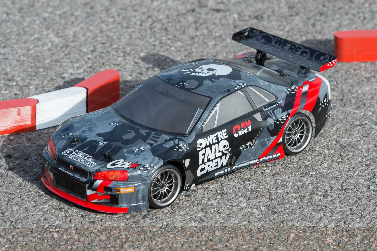 HPI Racing E10 Drift Nissan GT-R R34 Review outdoor posed with tecpro above