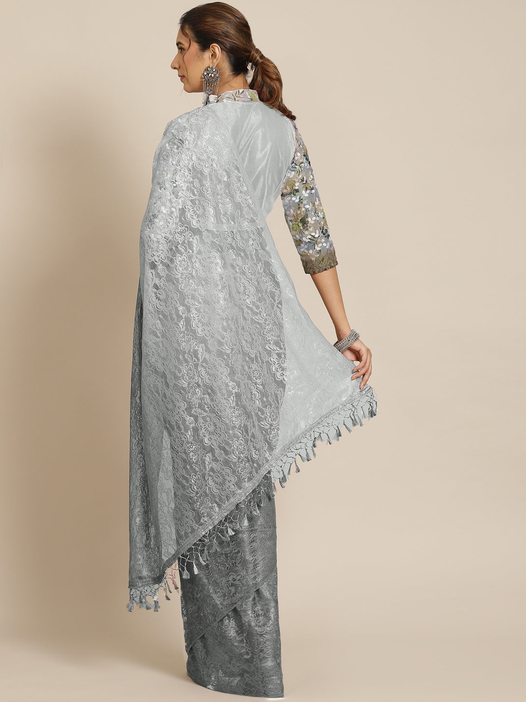 Asim Jofa - A beautiful silver grey Chantilly Lace saree embellished with  heavy borders in silver Kora, Dabka, Pearl and Sequin spray sprinkled all  over the saree with small bootis. #AsimJofa #IwearAsimJofa #