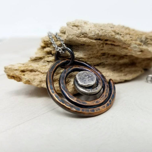 Sacred Spiral Symbol Necklace. Hammered Copper and Sterling Silver