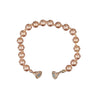 Bracelet, medium glass pearl with rhinestone magnet shackle.