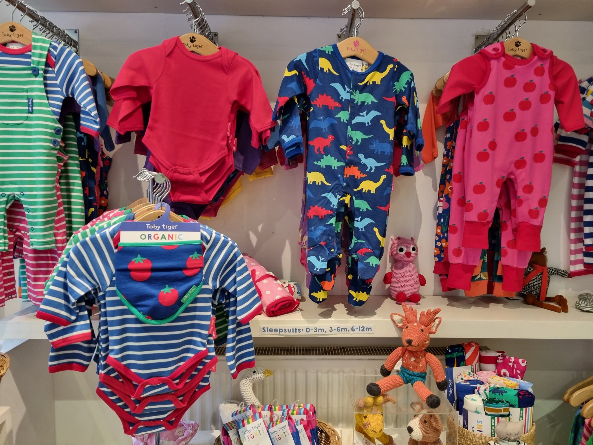 Baby sleepsuits in Toby Tiger Brighton