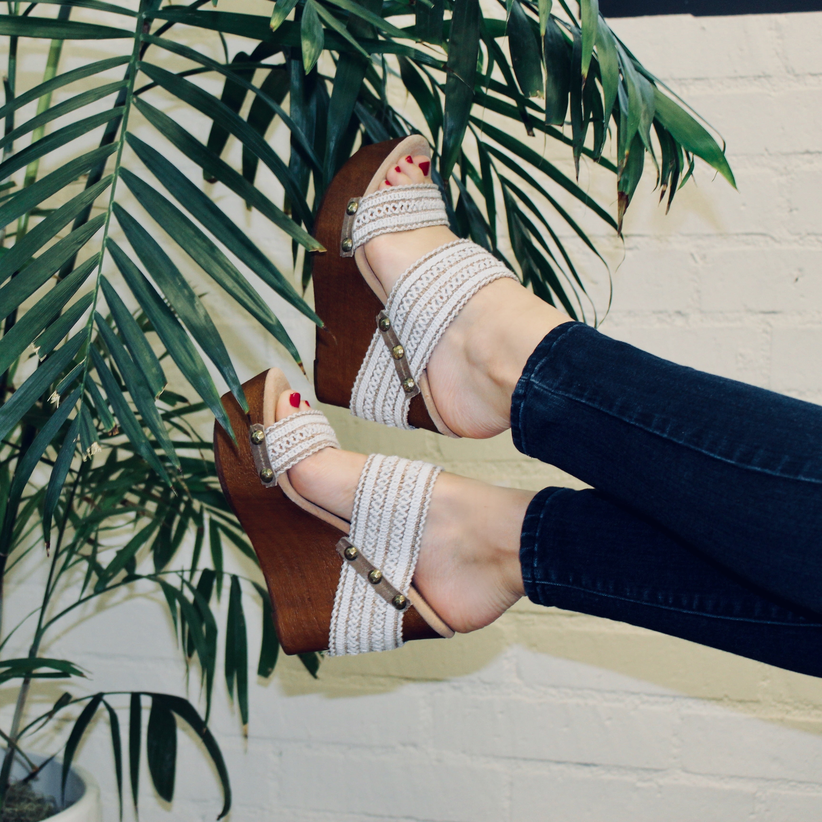 Layla wedges feature a wraparound two-banded macramé straw ribbon upper with stud detailing.