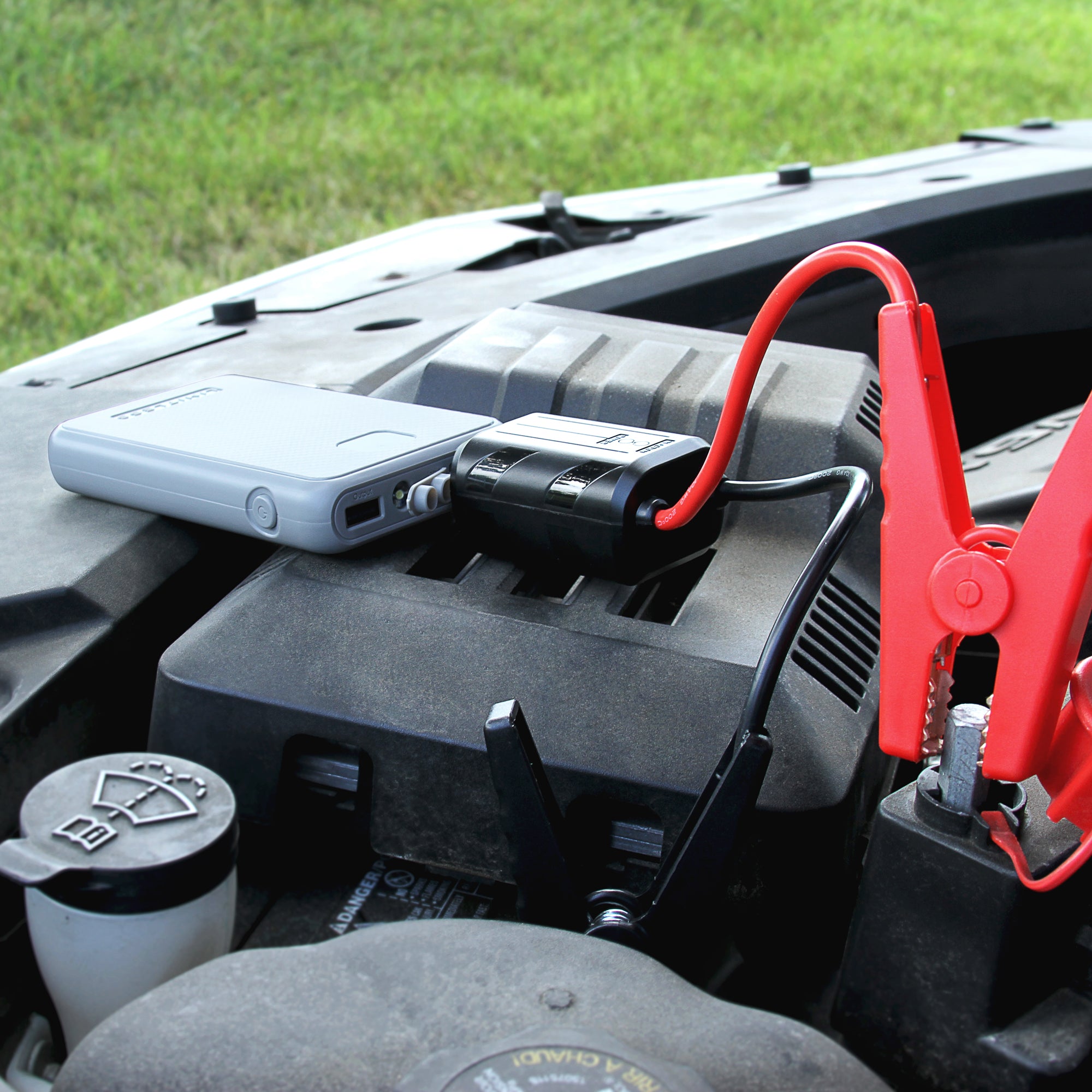 Jump a car with a portable jump starter