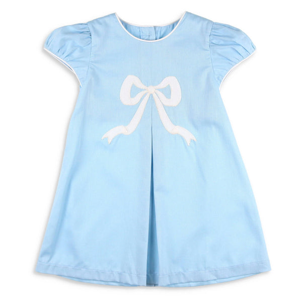 girl's blue dress with a white bow - 7 Adorable Easter Outfits For Kids