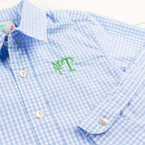 stacked library font monogram on a blue checked oxford shirt -Monogrammed Kid’s Clothing Guide