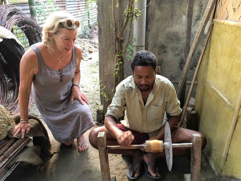 Hilly watching a mean spin thread in an outbuilding in India