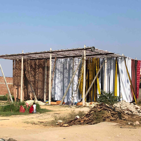 fabric drying in the mid day sun in India