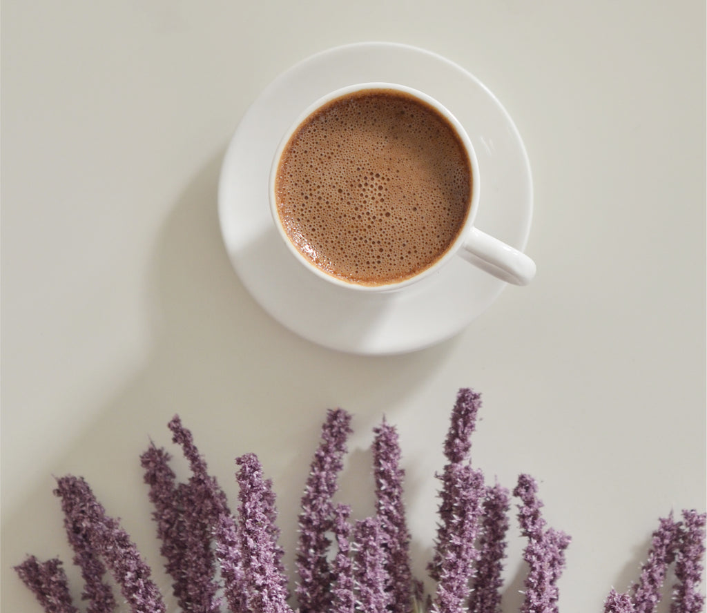 Cafe latte made with lavender flowers