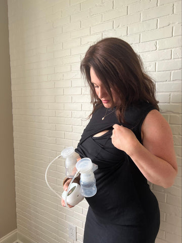 Woman using a breast pump