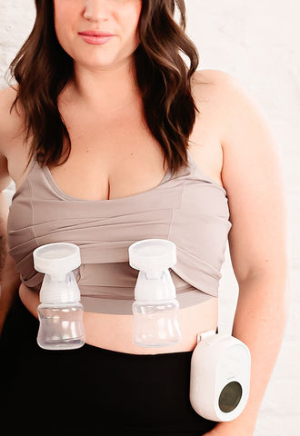 woman using a breast pump