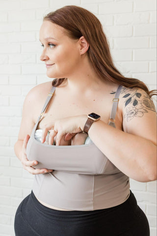 woman using a wearable breast pump