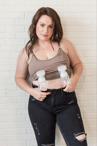 Woman modeling a Davin & Adley Amelia cami with breast pumps.