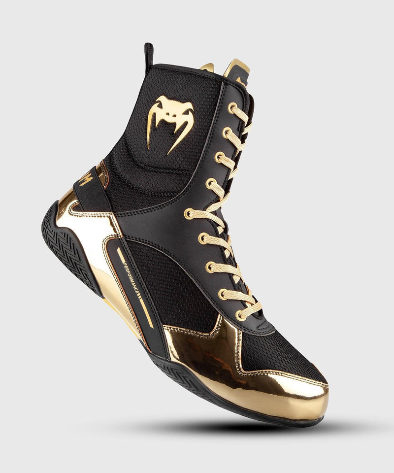 black and gold nike boxing shoes