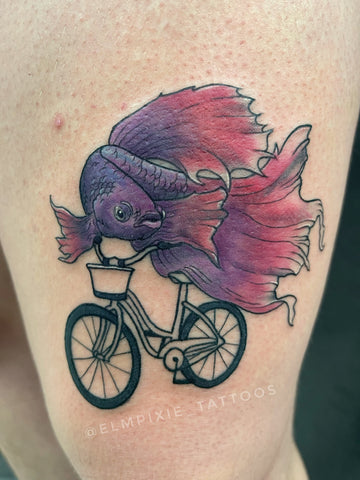 Ink Defense Proteam artist Em Whiteseth original tattoo design fish on a bike