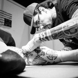 Tattoo Artist Nahann doing Tlingit tattoo work