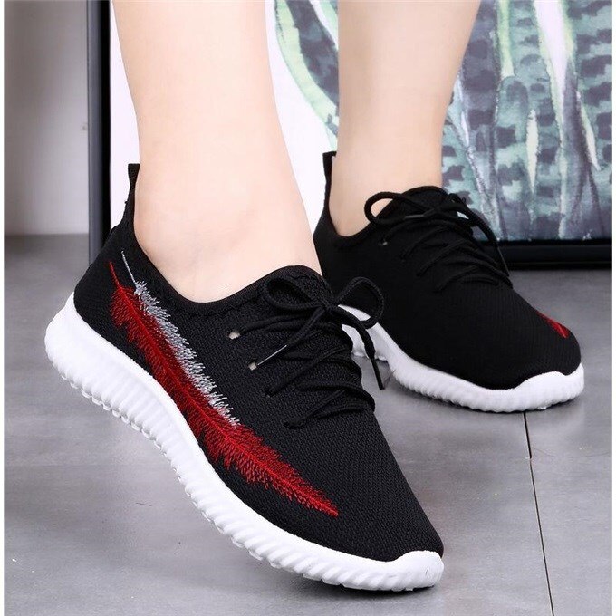 solid black tennis shoes womens