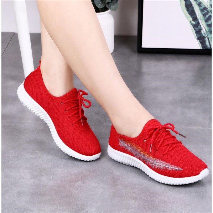 female red sneakers