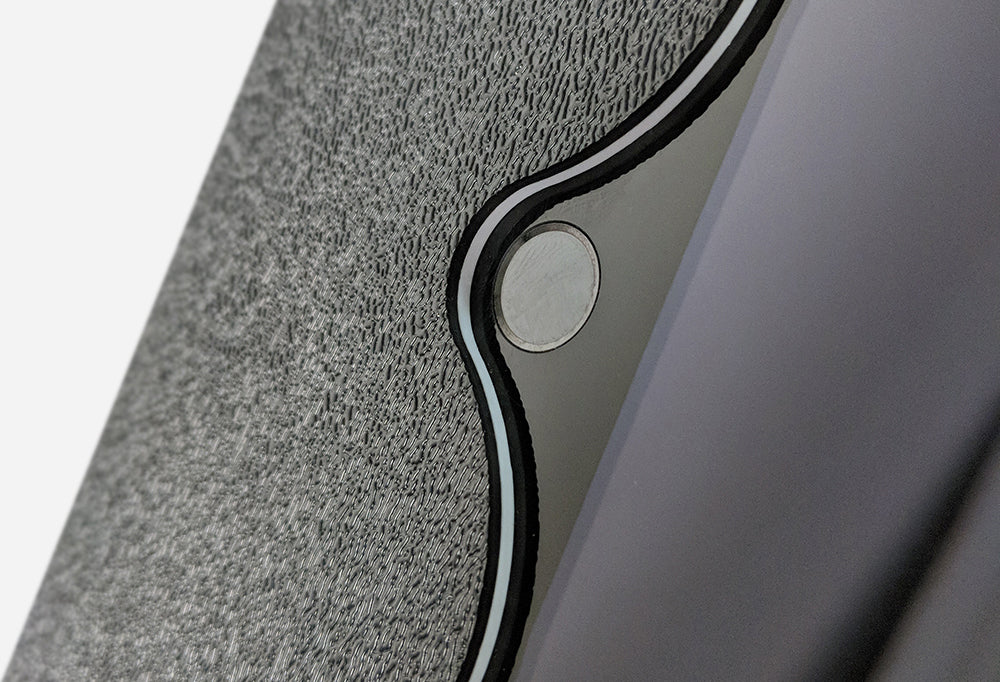 A cutout in the tablet enclosure for easy home button access.