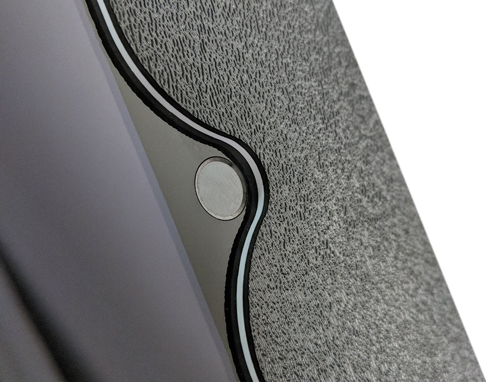 A cutout in the tablet enclosure for easy home button access.