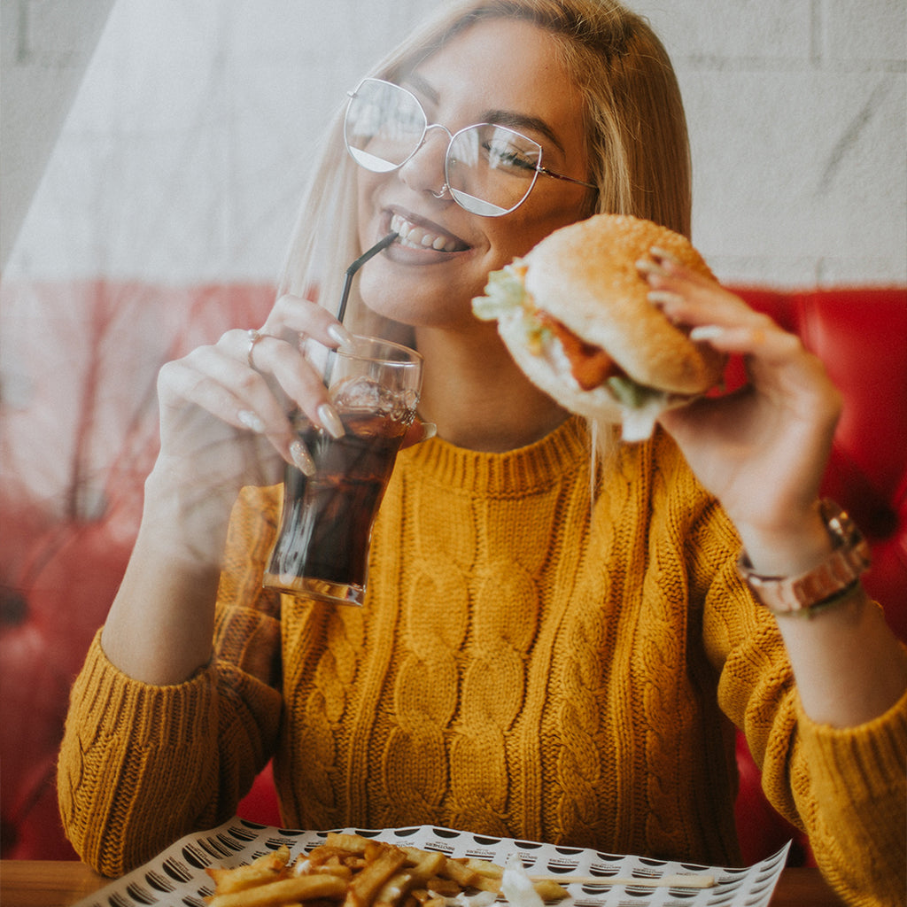 Girl eating burger