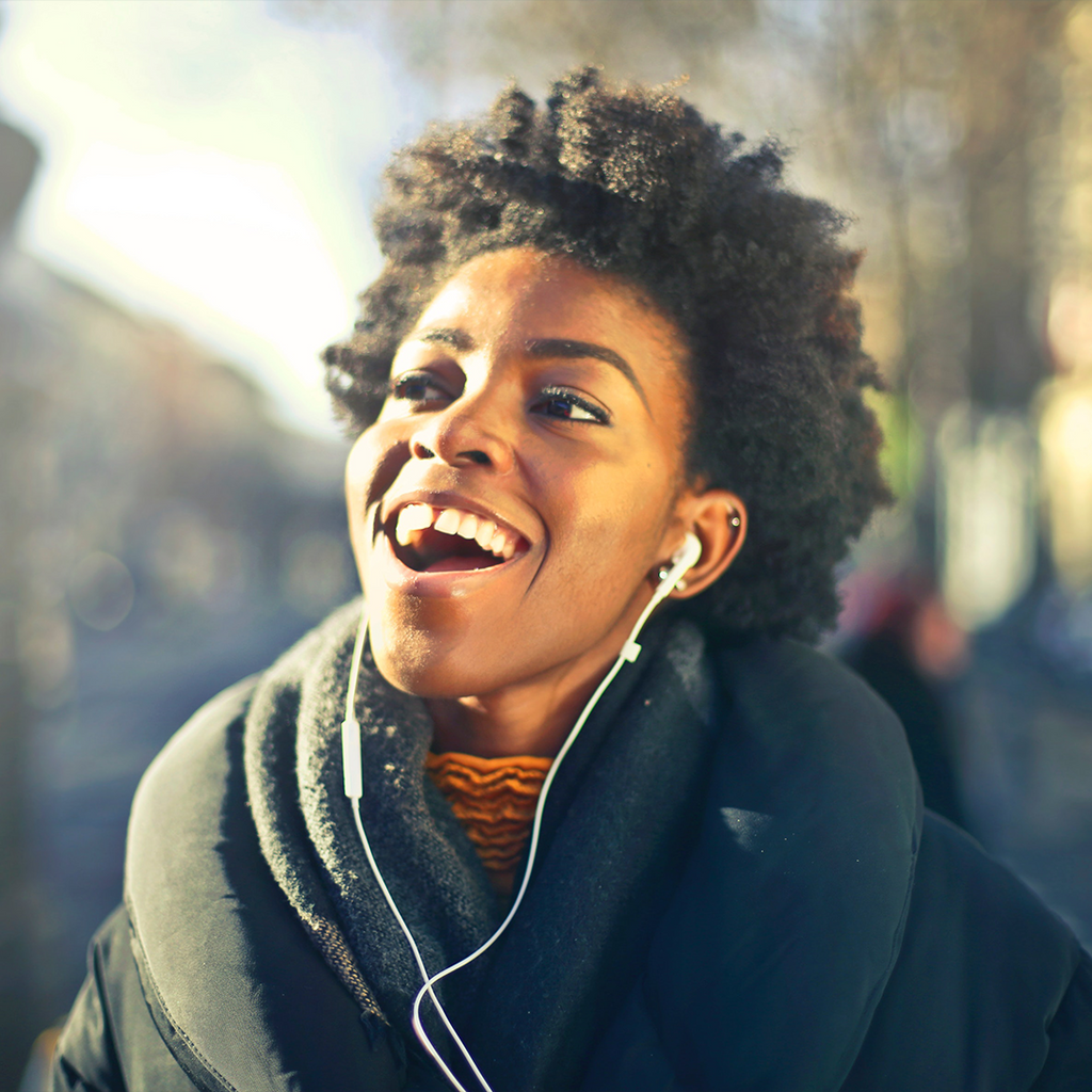 Woman smiling with headphones