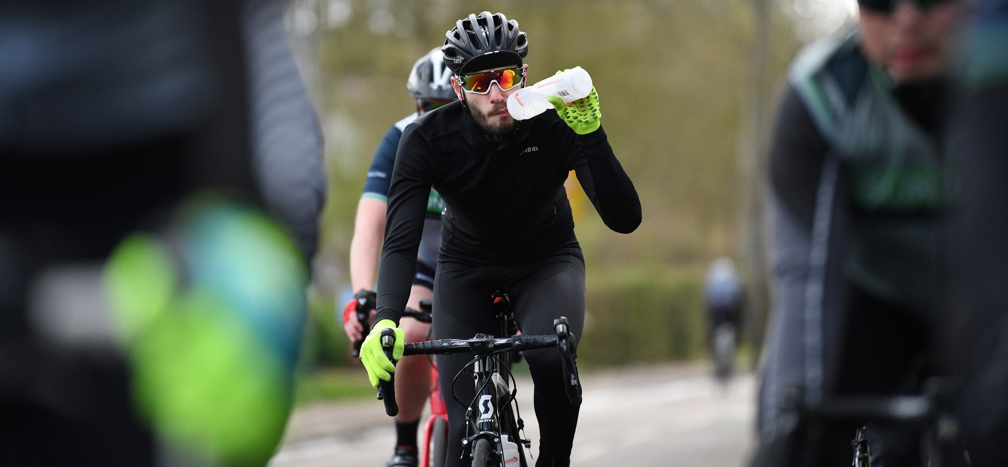 Cyclist takes a drink