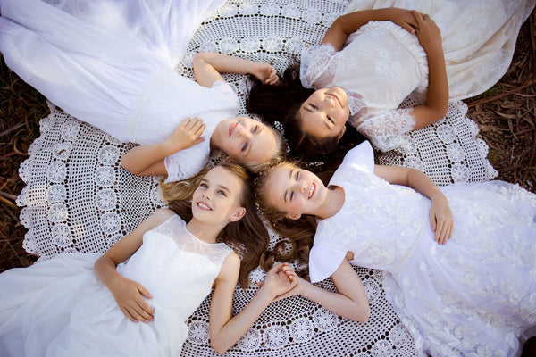 Happy girls wearing Ana Balahan flower girl dresses Australia