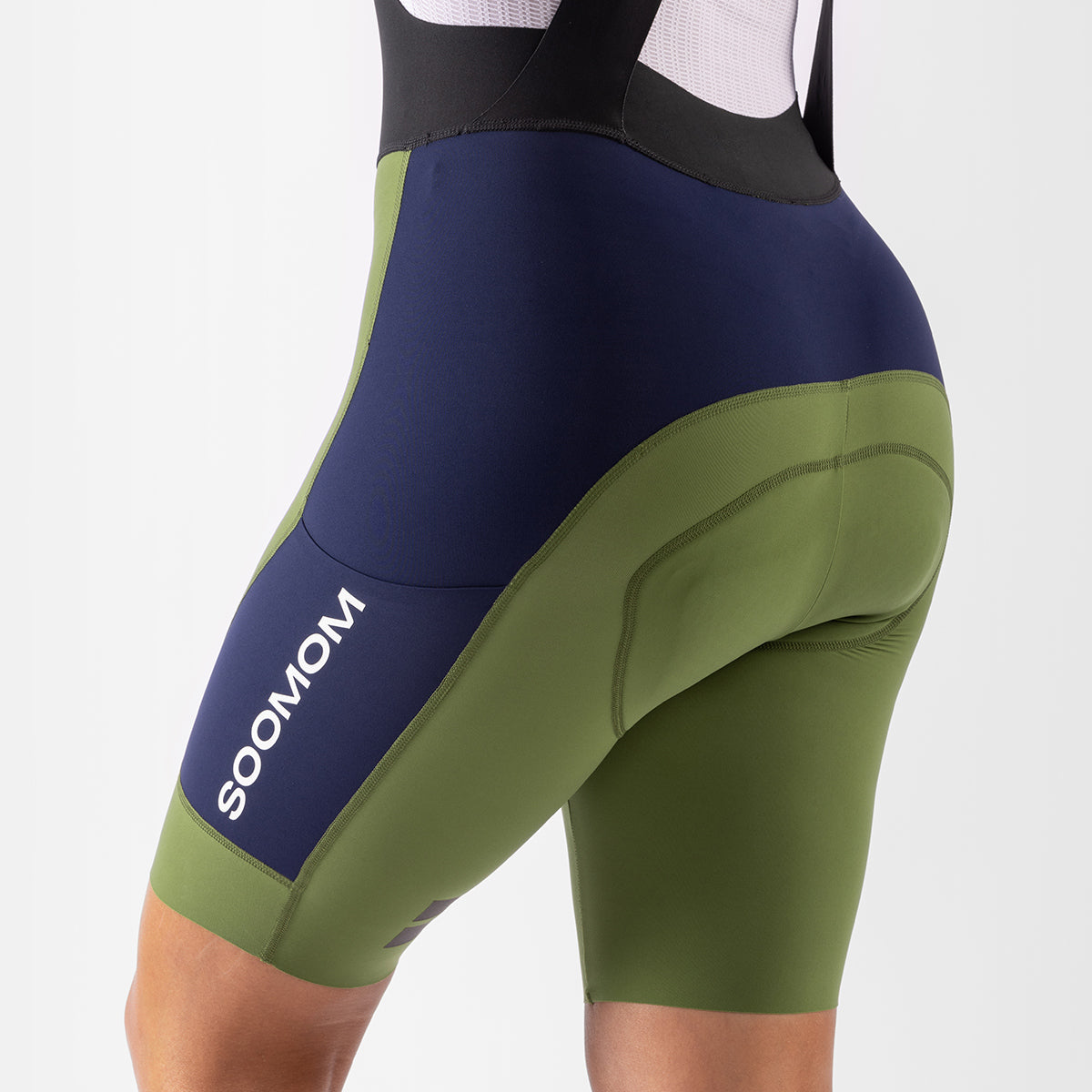 product_womensallroundcargobibshorts_navyolive_studio_03.jpg__PID:3d46240b-bd7c-43b2-8034-38484083300a