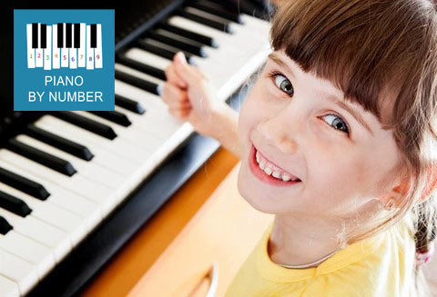 Happy Girl Playing Piano