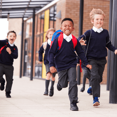 Kids running at school