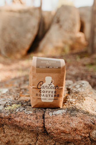 Cedar Creek Blend Coffee Beans Bag Outside On a Rock and subscription