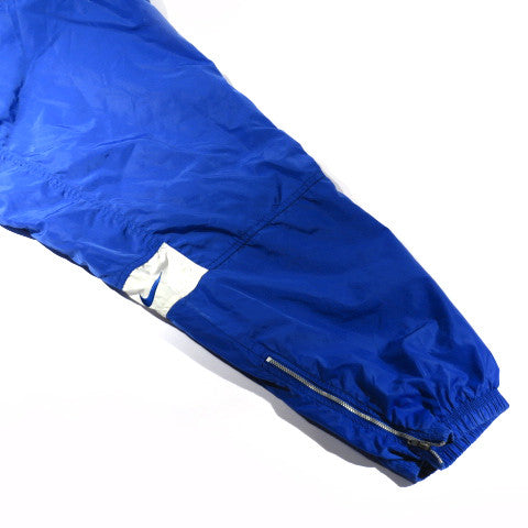 blue nike windbreaker pants