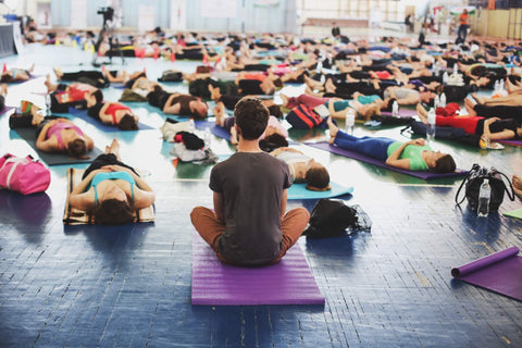 Group of people doing yoga