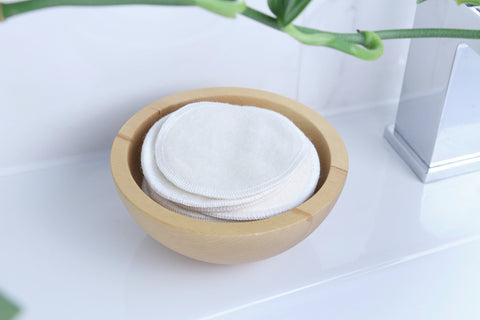 reusable makeup cotton pads in a container in the bathroom