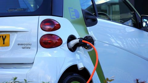 electric car being fuel by renewable energy