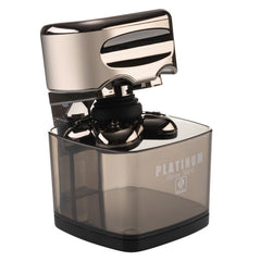 a Platinum Shaver By Skull Shaver put in a Rinse stand