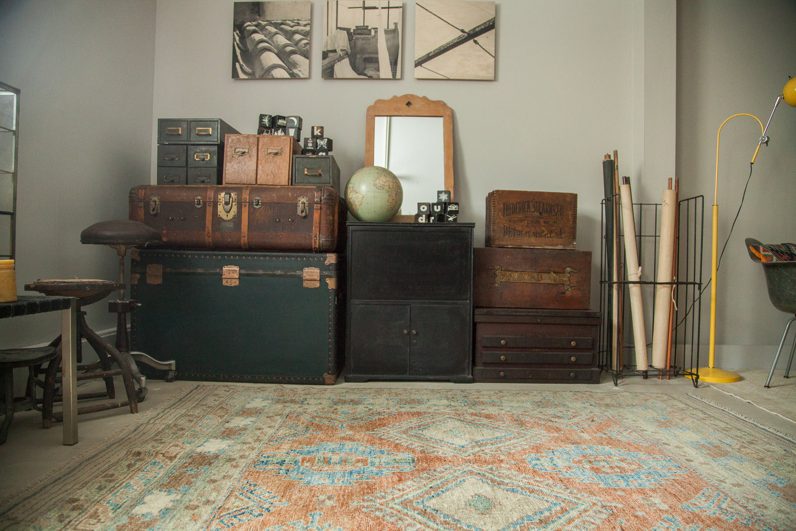 Vintage Luggage, mirrors, globes, and more along with vintage rugs and antique carpets are stored in our studio barn in New York