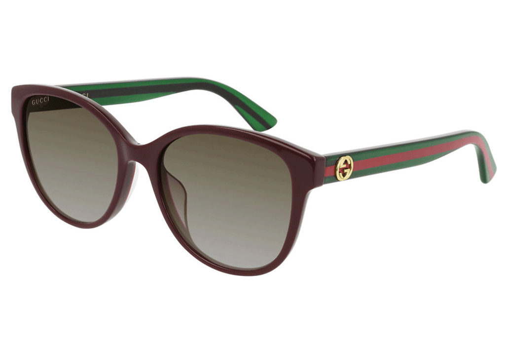 Gucci burgandy ladies sunglasses with red and green striped arms