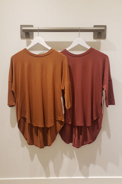 (Left to Right) Ainsley Tee in Copper & Auburn 